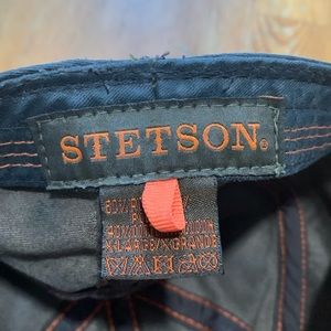 Brown faux leather newsboy, gangster cap.